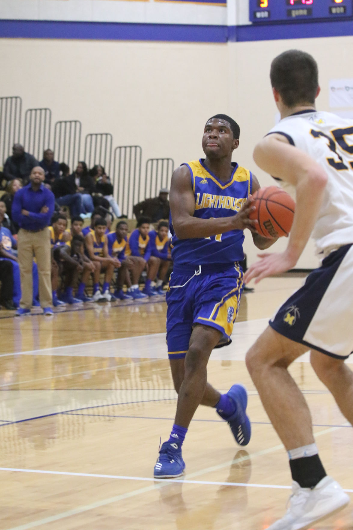 Gallery: Lighthouse at Marquette Catholic boys basketball